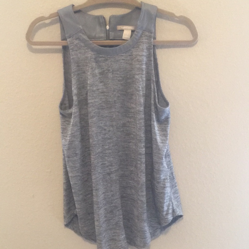 Grey top with leather around the neck